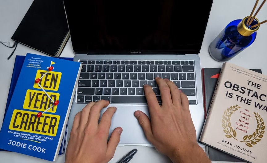 typing on laptop
